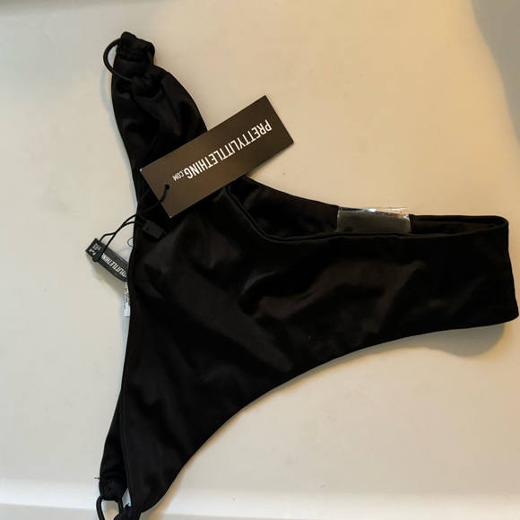 PRETTY LITTLE THING black bikini bottom never worn. Great condition. Super cute. - Picture 2 of 3